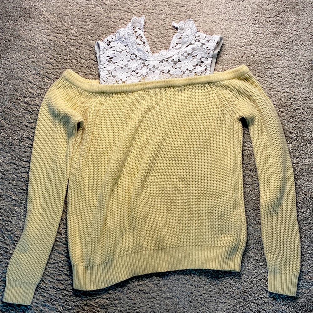 Cream knit sweater with cut out shoulder and lace neck line